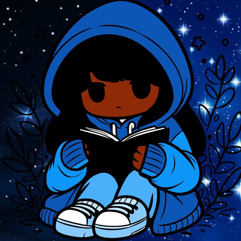girl in oversized hoodie reading a book