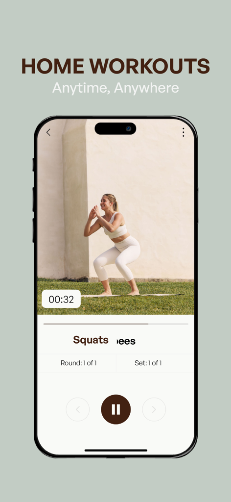 Transform by Fitaz - A woman performing squats in a home workout video session on the Transform by Fitaz app