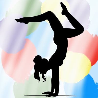 a woman doing a handstand