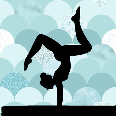 a woman doing a handstand
