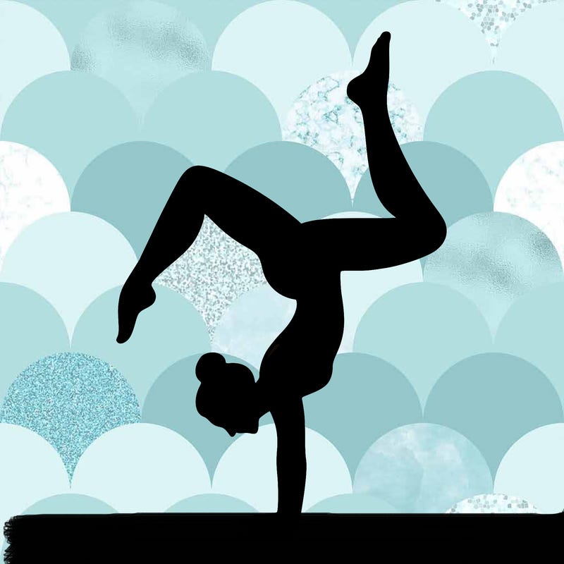 a woman doing a handstand