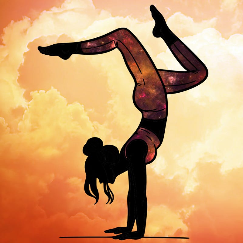 a woman doing a handstand