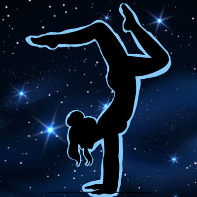 a woman doing a handstand