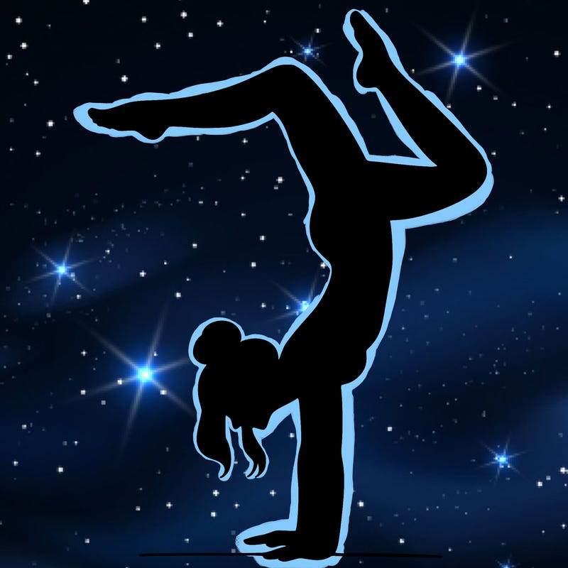 a woman doing a handstand