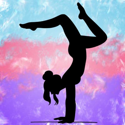 a woman doing a handstand