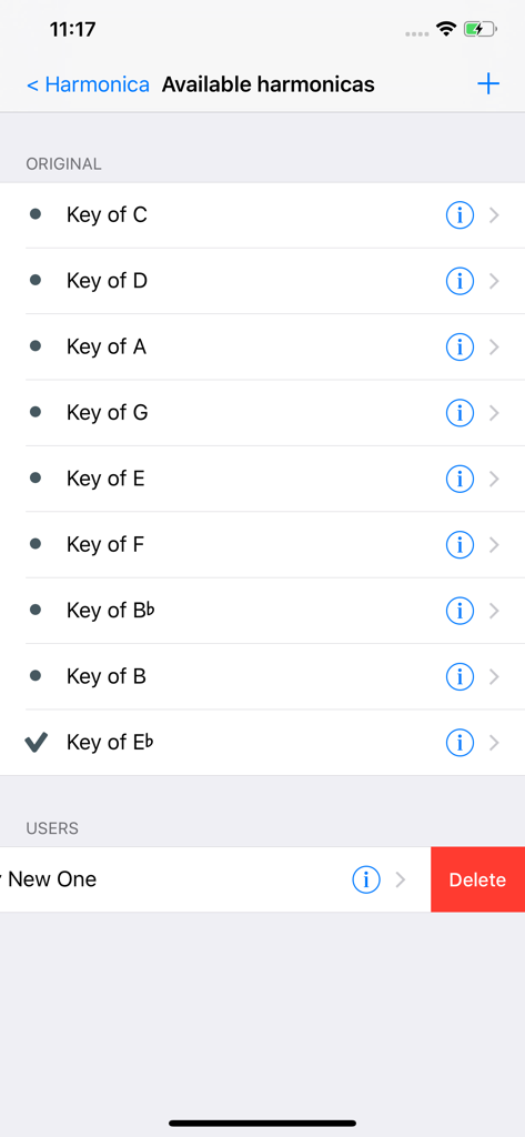 A screen in the Harmonica Tuner Pro app displaying a list of available harmonica keys like C, D, A, and G.