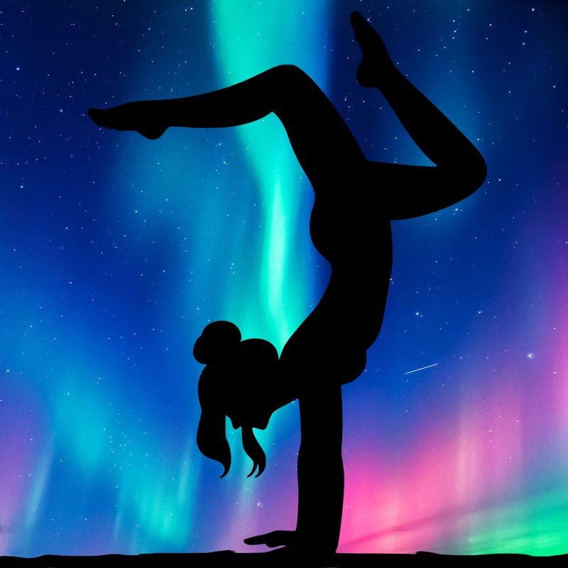 a woman doing a handstand