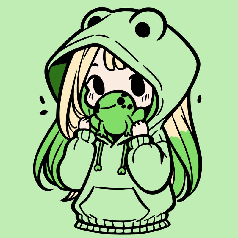 a girl holding a froggy hoodie