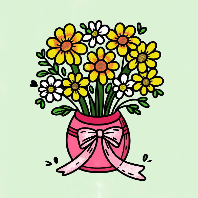 flowers in a cute little vase with a bow around the vase