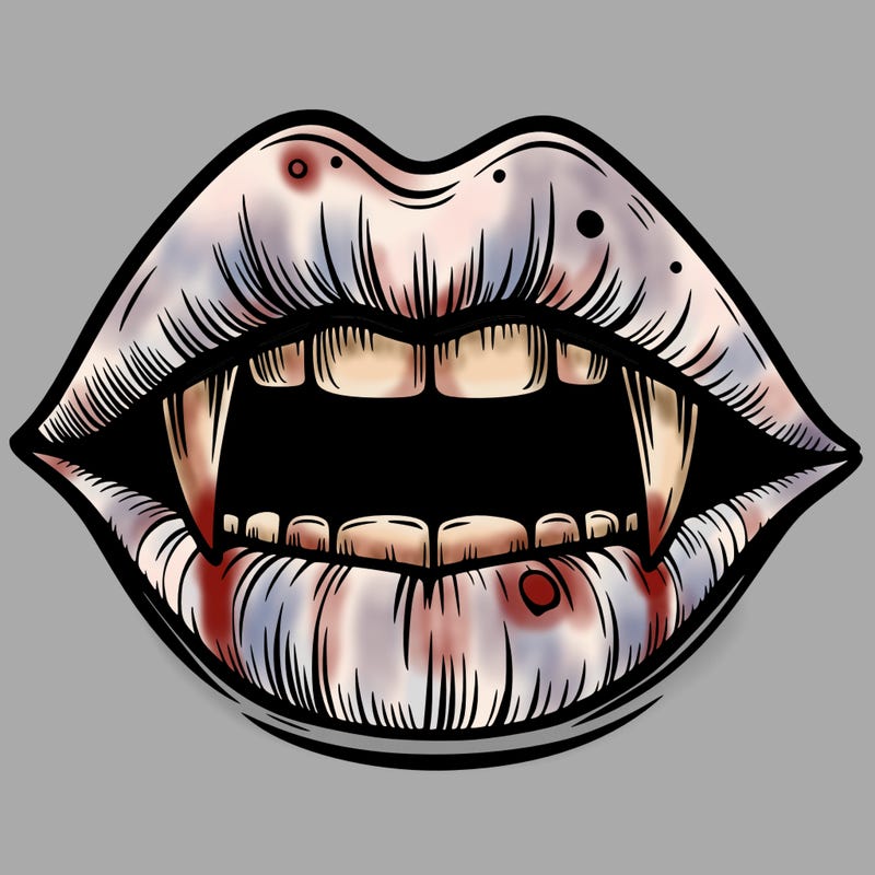 lips with vampire teeth