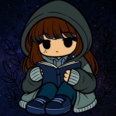 girl in oversized hoodie reading a book