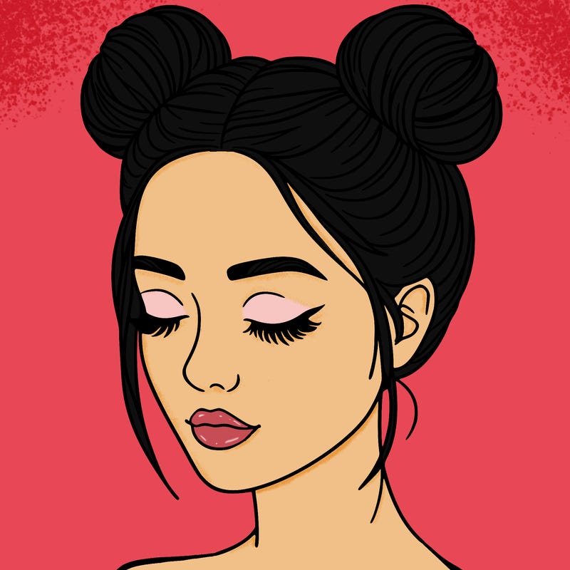 woman with hair buns