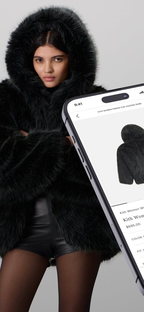Kith - A model wearing a black fur hooded robe next to a smartphone showing the Kith app product page