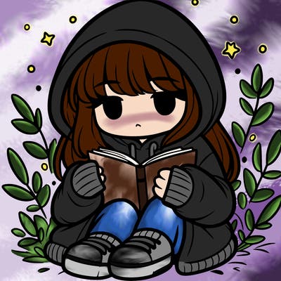 girl in oversized hoodie reading a book