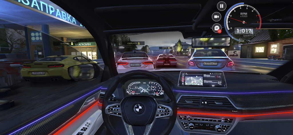 First person cockpit view of a car driving through night traffic in a Russian village