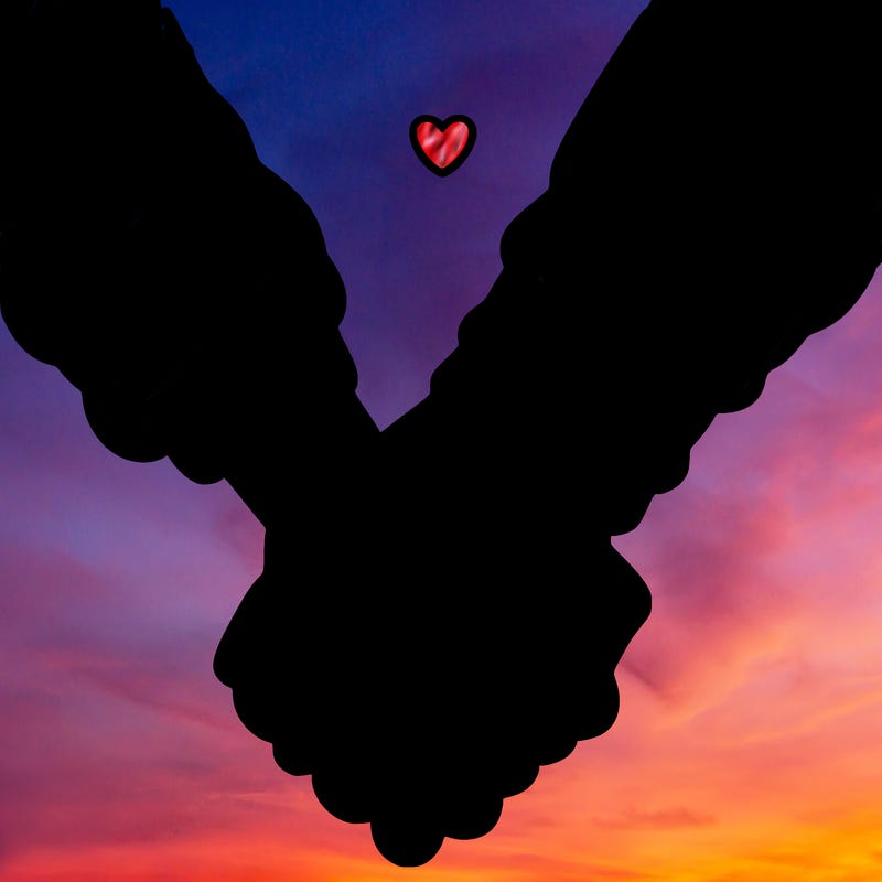 two holding hand one girl hand and one boy hand