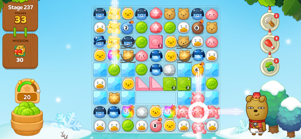 귀여운 카카오프렌즈 캐릭터 블록이 있는 매치 3 퍼즐 그리드를 보여주는 프렌즈 타운 모바일 게임 플레이