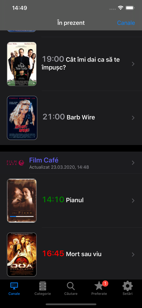 Pantalla de la aplicación Horario de TV Rumana mostrando títulos de películas y pósteres con horarios de emisión locales