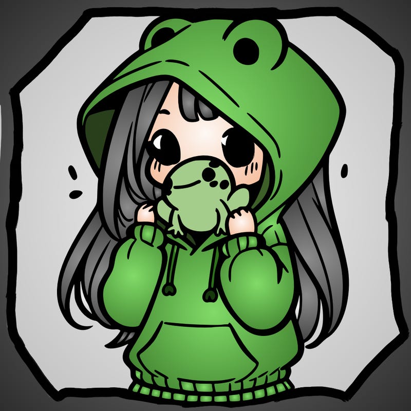 a girl holding a froggy hoodie