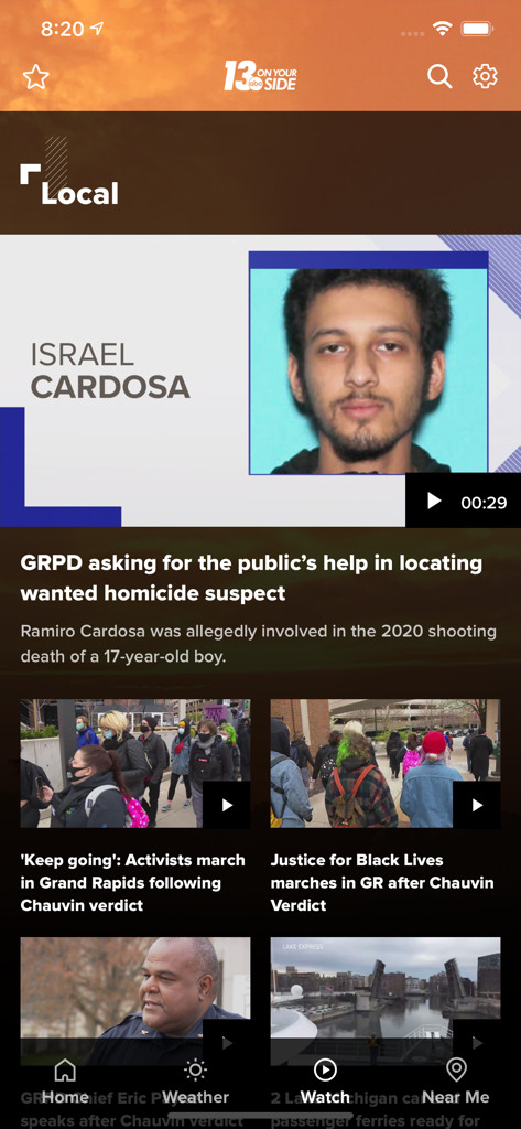 A screenshot of the 13 ON YOUR SIDE news app showing local headlines and breaking news alerts for West Michigan.