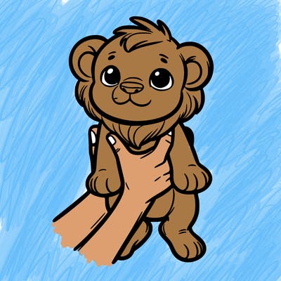 baby lion being held up
