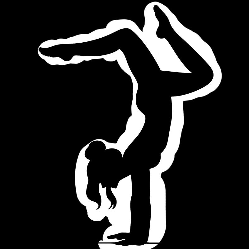 a woman doing a handstand