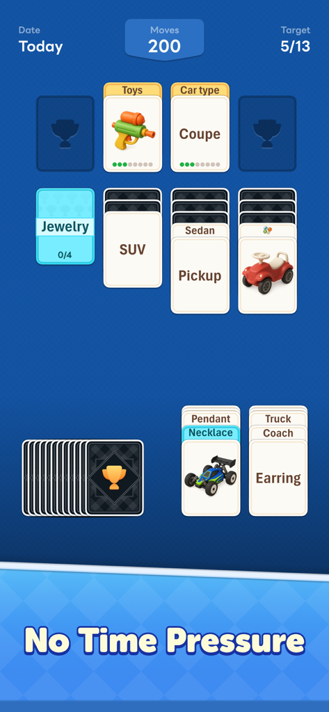 Word Solitaire Now! - Jugabilidad de Word Solitaire Now mostrando cartas de palabras siendo clasificadas en categorías como juguetes y tipos de autos sin límite de tiempo.
