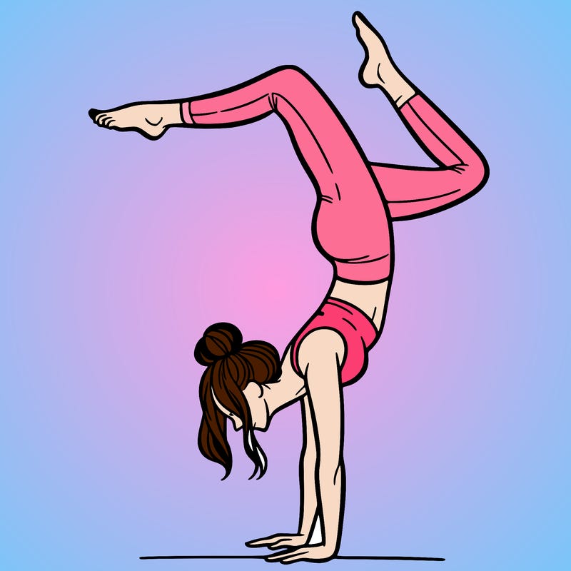 a woman doing a handstand