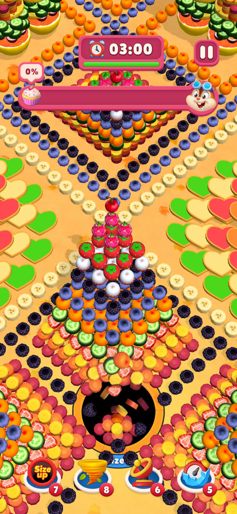 Ever Eater 3D - Screenshot di gameplay di Ever Eater 3D che mostra un buco nero inghiottire frutta colorata e cuori in un livello soleggiato.