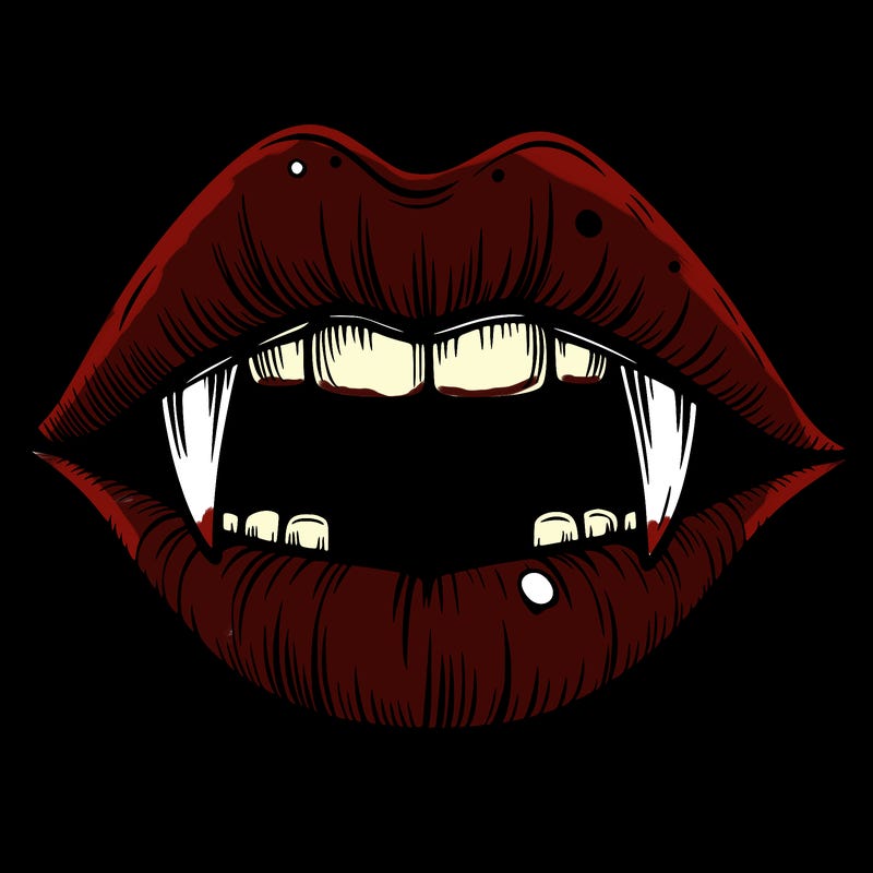 lips with vampire teeth