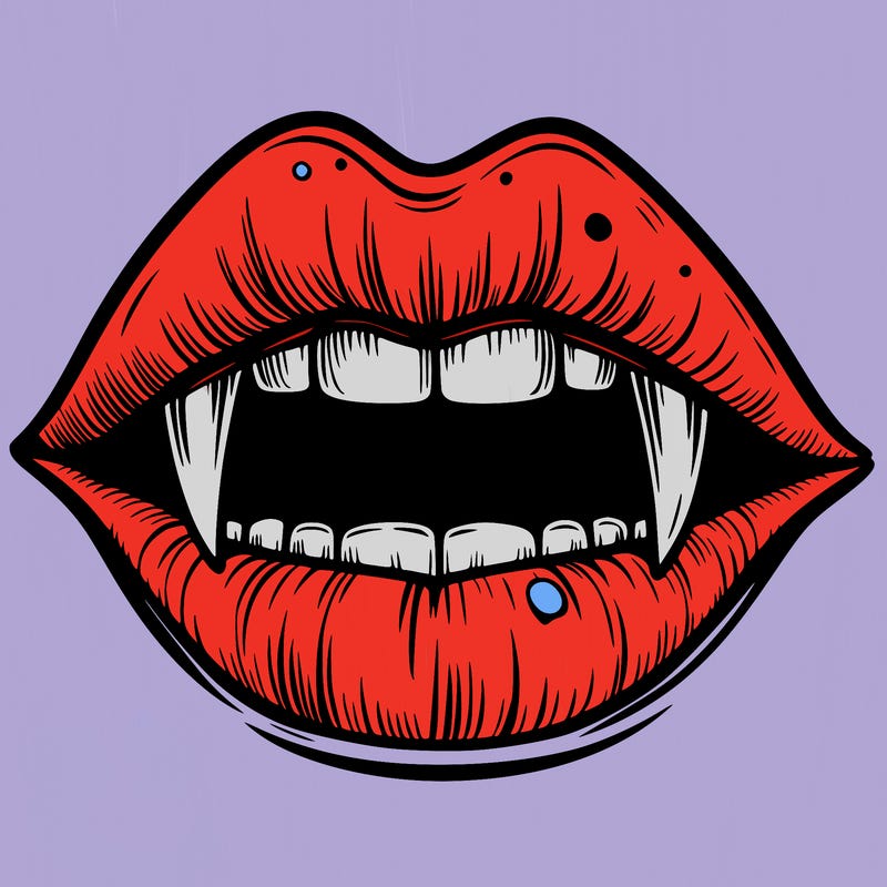 lips with vampire teeth