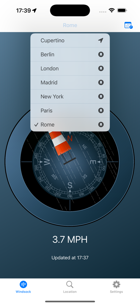 Windsockアプリのスクリーンショット、ローマの風速と風向が表示され、保存された都市のドロップダウンリストが表示されています。