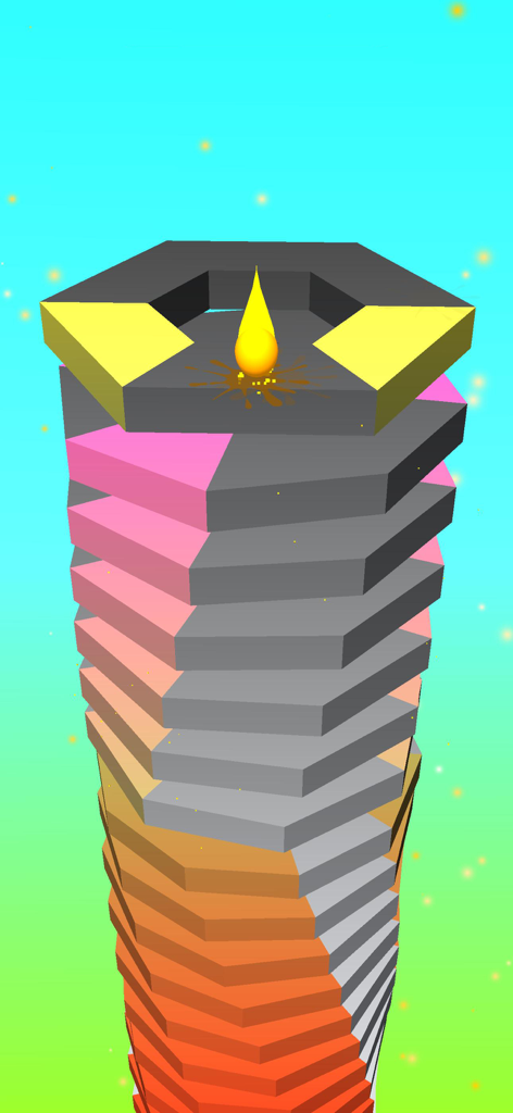 Yellow ball on top of a colorful spiral block stack in Crush Ball game