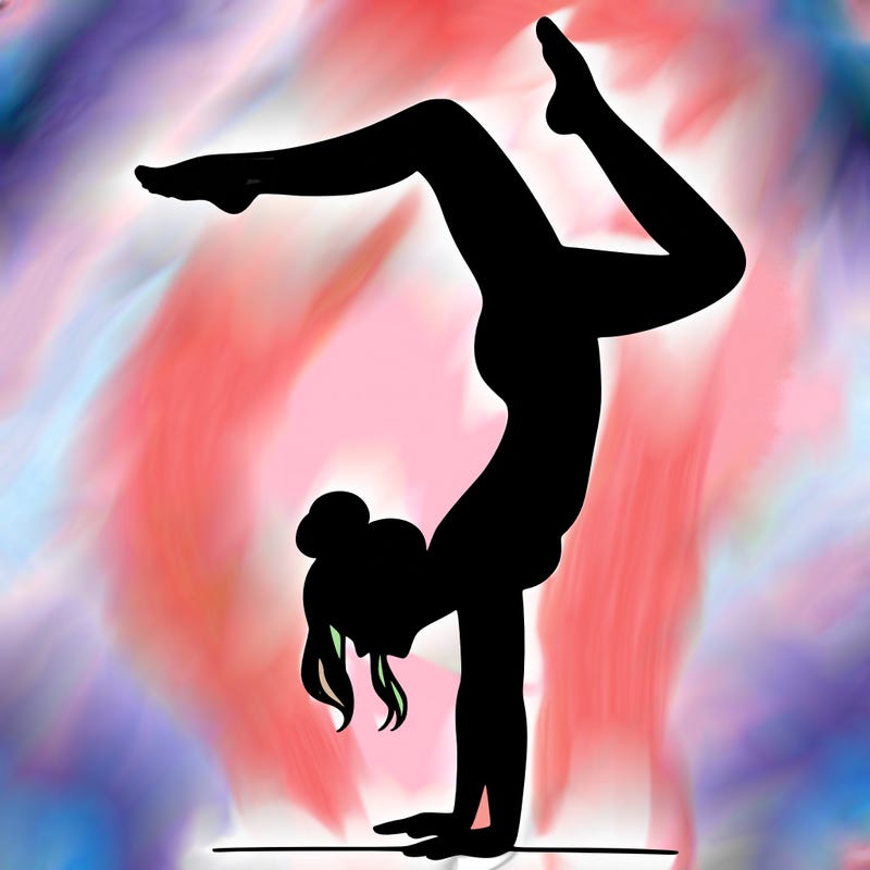 a woman doing a handstand
