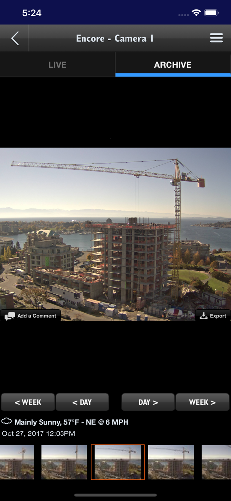 Multivista mobile app interface displaying an archived webcam photo of a construction site with a crane and building progress