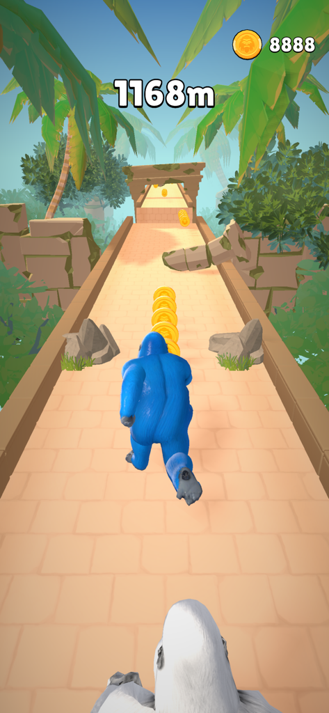 Um personagem yeti azul corre por um caminho na selva coletando moedas de ouro no jogo Yeti Bigfoot Fluffy.