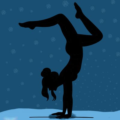 a woman doing a handstand