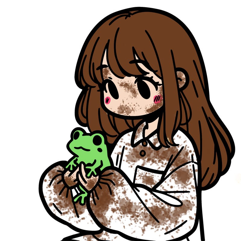 girl with long hair and a oversized shirt. and she is holding a frog