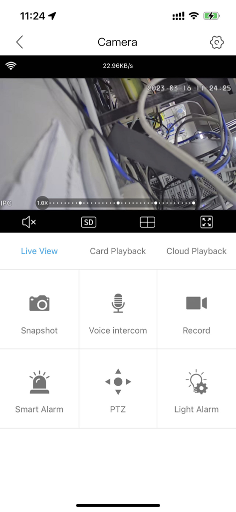Tris Home - Tris Home mobile app interface showing a live camera feed with snapshot and voice intercom control buttons