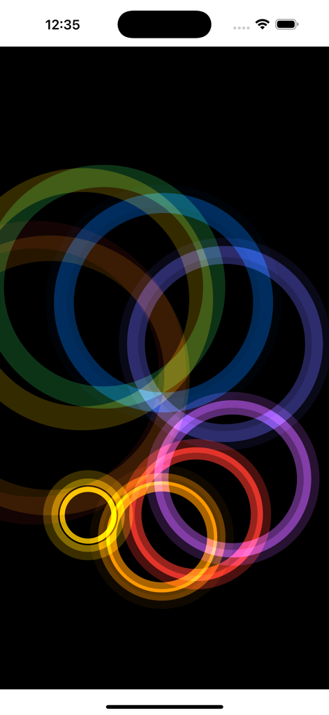 Rainbow Ripples - Colorful translucent circles overlapping on a black background representing digital ripples
