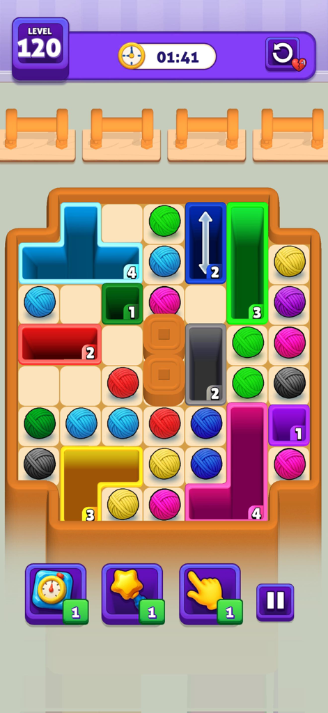Drop Color Match: Block Puzzle - Gameplay of Drop Color Match showing colored yarn balls and shaped puzzle blocks