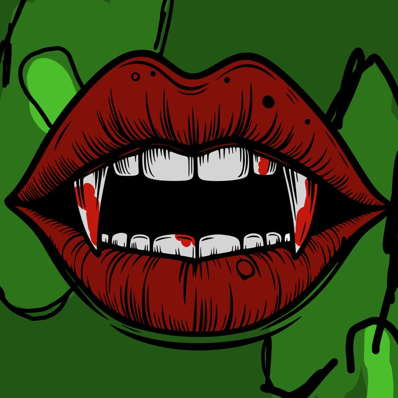 lips with vampire teeth