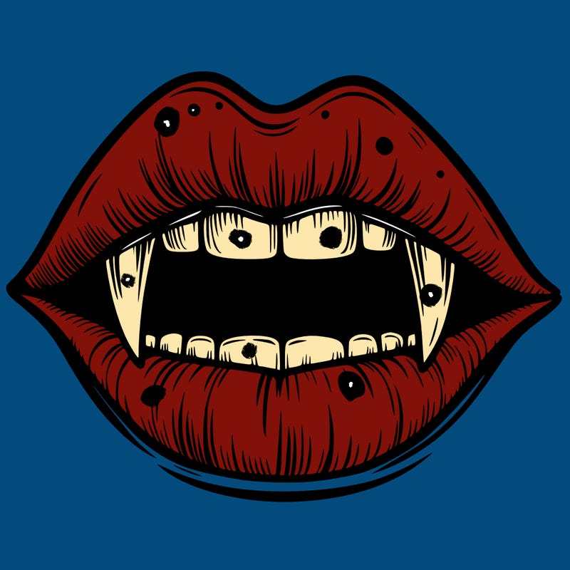 lips with vampire teeth