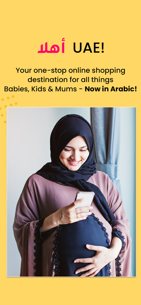 Smiling pregnant woman using FirstCry Arabia app for baby and kids shopping in UAE