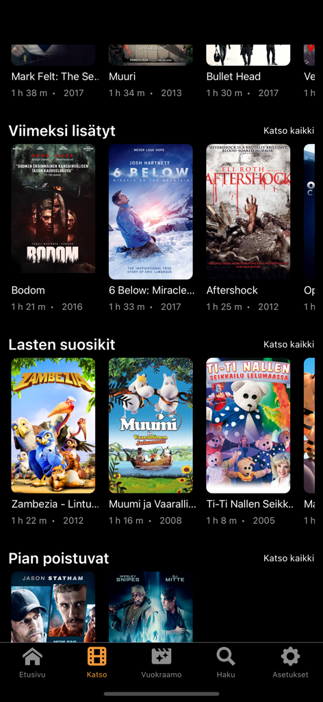 Kotikino - Kotikino mobile application interface featuring Finnish movie categories and posters.