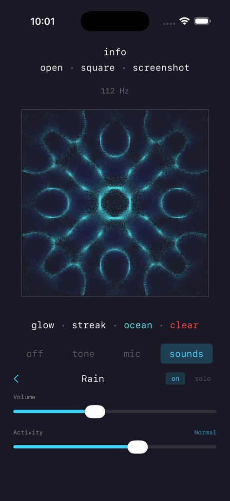 Cymatica: Sounds & Visualizer - Cymatica app interface showing a symmetrical blue sand pattern and rain sound settings.