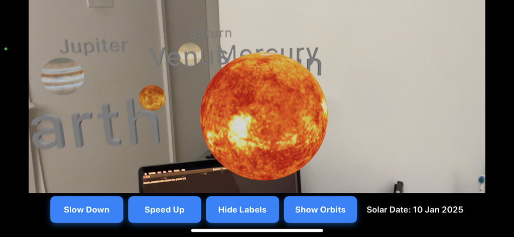 AR Solar System: AR Planets - Augmented reality view of the sun and labeled planets in a room