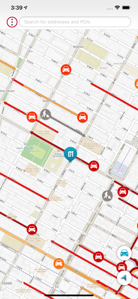 Door to Door Navigation - Uma visualização de mapa da cidade dentro do aplicativo Nissan Door to Door Navigation mostrando condições de tráfego e direções de caminhada em uma área urbana