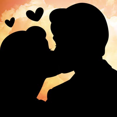 woman and man kissing