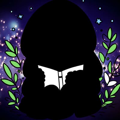 girl in oversized hoodie reading a book